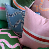 Spaghetti lumbar cushion in pink + neon orange